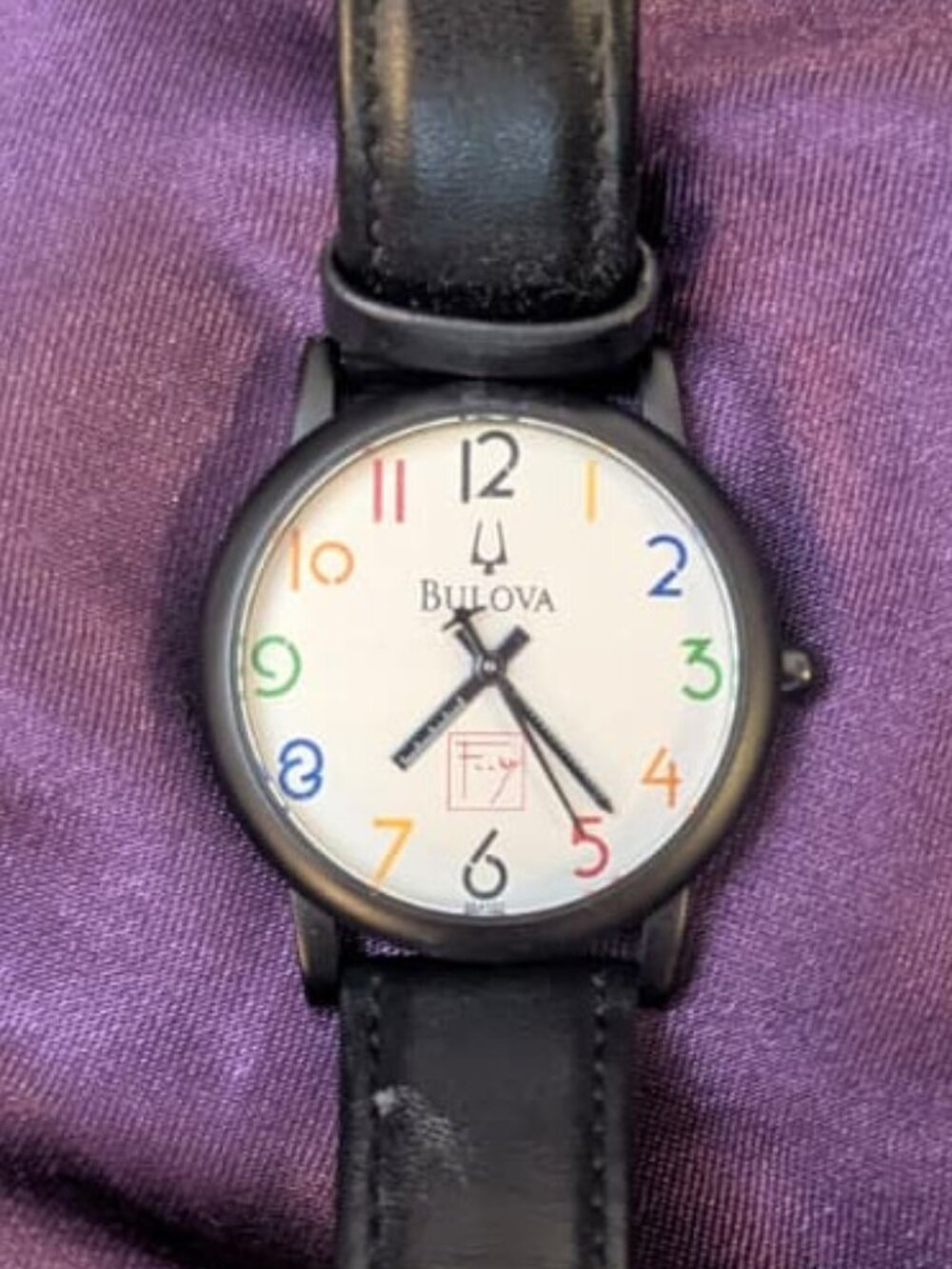 Bulova Watch - Black leather band - rainbow numbers